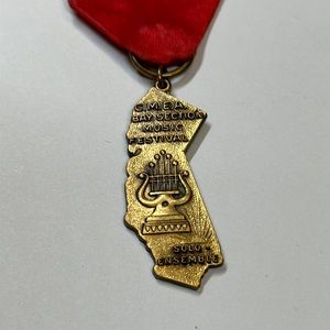 Vintage school music festival solo ensemble medal ribbon